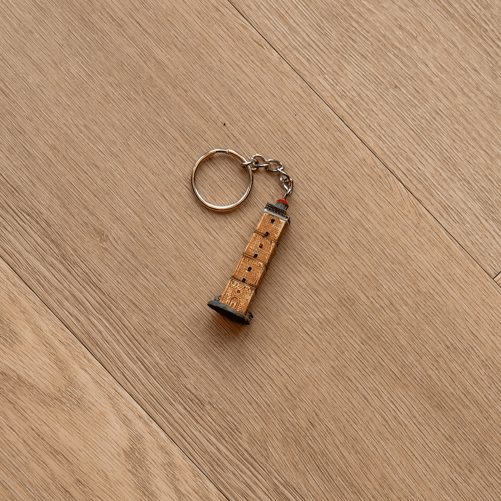 Een sleutelhanger in de vorm van de Brandaris.